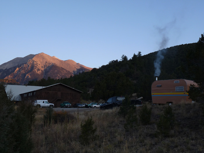 Livin' the Dream: a wood stove in a travel trailer provides the comfort of &ldquo;home&rdquo; for a Boise smokejumper. Like all of Colorado Firecamp's classes, the S-230/231 Crew Boss/Engine Boss actually does include lodging and meals at the Ponderosa Lodge. 
